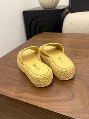 CHANEL 26S PLATFORM SLIDES 40 MM IN PASTEL YELLOW WOVEN RAFFIA