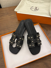 HM 26S ORAN STUDDED SANDALS IN BLACK CALFSKIN