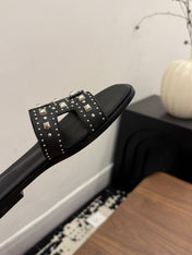 HM 26S ORAN STUDDED SANDALS IN BLACK CALFSKIN