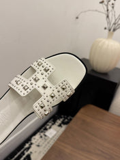 HM 26S ORAN STUDDED SANDALS IN WHITE CALFSKIN