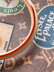 ONTHEGO VOYAGE 35 IN BROWN MONOGRAM CANVAS WITH VINTAGE HOTEL LABELS