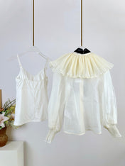 WHITE DRESSY TOP WITH BLACK TIE-NECK