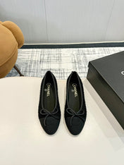BALLET FLATS IN BLACK TWEED AND FABRIC