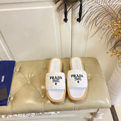 PRADA 26S SLIDE SANDALS CORK SOLE IN WHITE LOGO RAFFIA