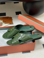 FLAT SLIPPERS IN MOSS GREEN CALFSKIN SNAKE EMBOSSING