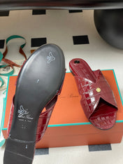 FLAT SLIPPERS IN RED CALFSKIN SNAKE EMBOSSING