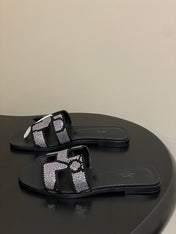 HM 25S ORAN SANDAL IN BLACK LAMBSKIN WITH WHITE STONE DETAILS