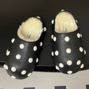 BALENCIAGA 25S FUR-LINED MULES IN BLACK AND WHITE FAUX LEATHER