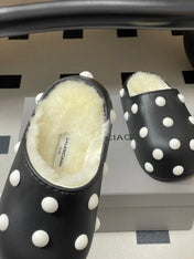 BALENCIAGA 25S FUR-LINED MULES IN BLACK AND WHITE FAUX LEATHER