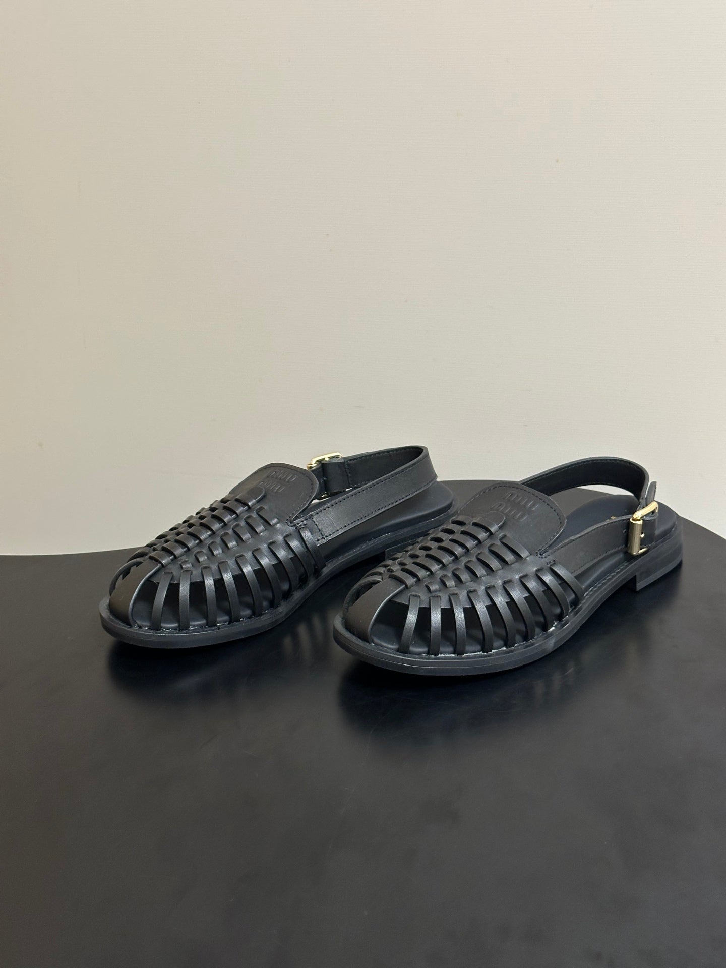 MIUMIU 26S SLINGBACK FISHERMAN SANDALS IN BLACK CALFSKIN