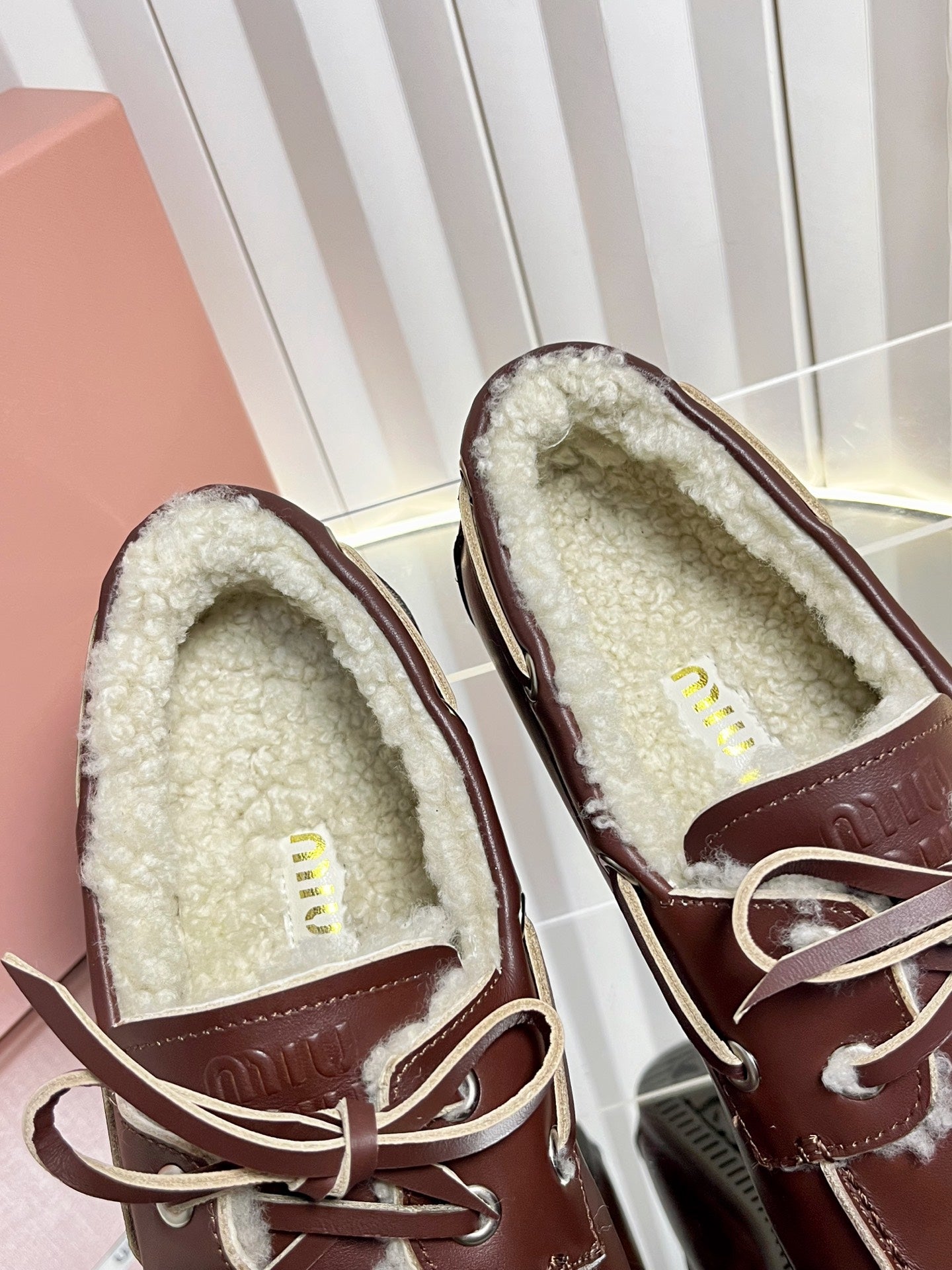 MIUMIU 26S FUR BOAT SHOES IN BROWN CALFSKIN