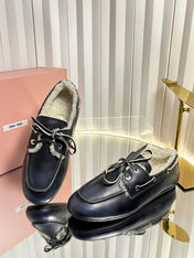 MIUMIU 26S FUR BOAT SHOES IN BLACK CALFSKIN