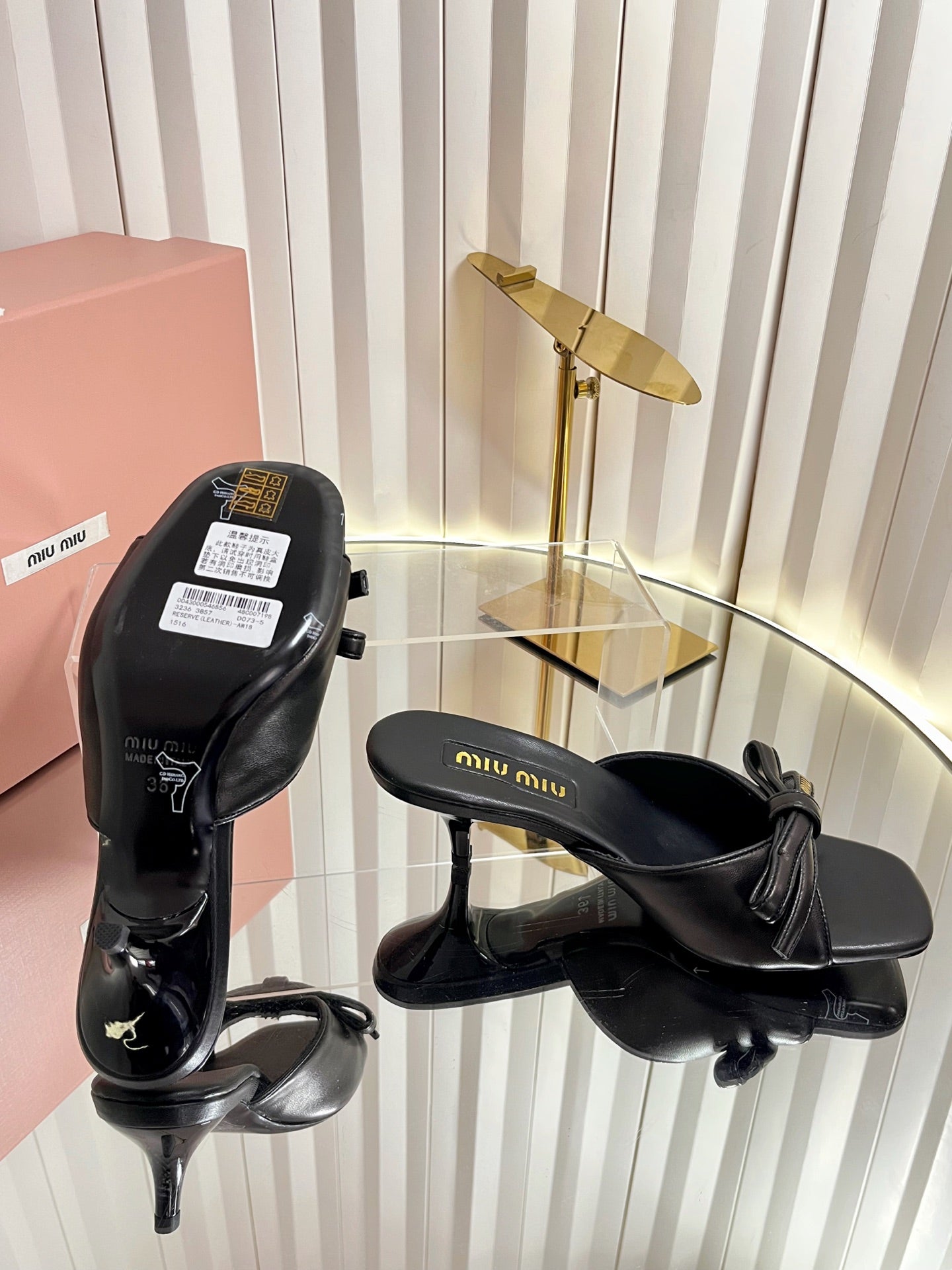 MIUMIU 26S MULE SANDALS 55MM IN BLACK CALFSKIN WITH BOW