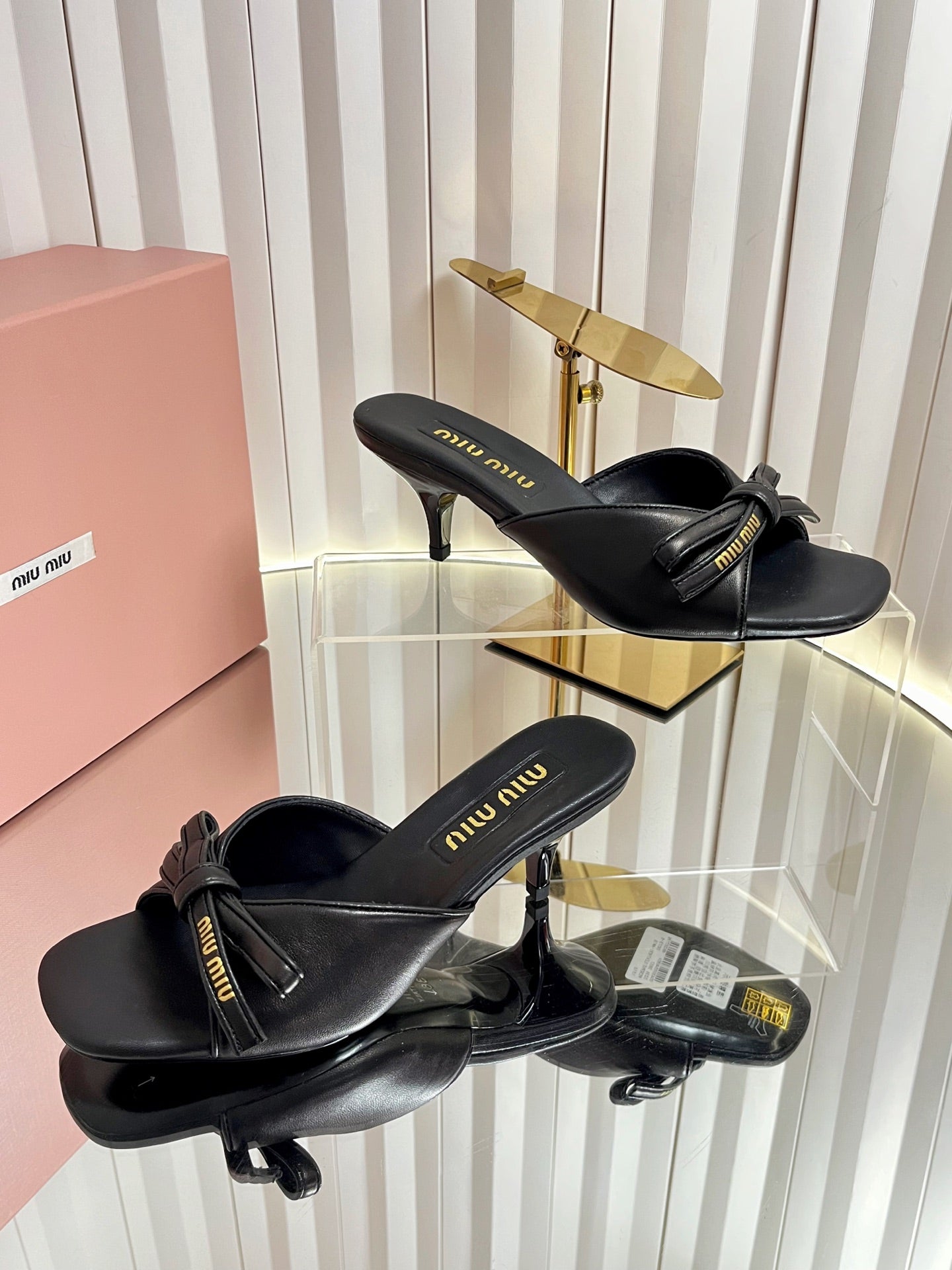 MIUMIU 26S MULE SANDALS 55MM IN BLACK CALFSKIN WITH BOW