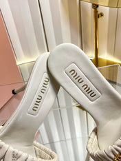 MIUMIU 26S HIGH-HEEL MULE SANDALS 85MM IN LIGHT BEIGE CALFSKIN GOLD HARDWARE