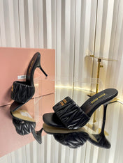 MIUMIU 26S HIGH-HEEL MULE SANDALS 85MM IN BLACK CALFSKIN GOLD HARDWARE