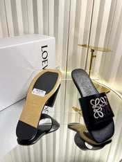 LOEWE 26S LOGO-EMBROIDERED SANDALS IN BLACK CALFSKIN