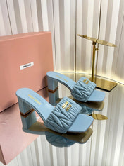 MIUMIU 26S PADDED MATELASSE MULE HEELS 65MM IN LIGHT BLUE CALFSKIN GOLD HARDWARE