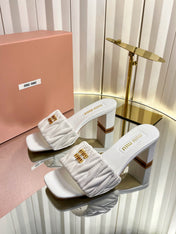 MIUMIU 26S PADDED MATELASSE MULE HEELS 65MM IN WHITE CALFSKIN GOLD HARDWARE