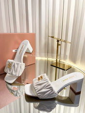 MIUMIU 26S PADDED MATELASSE MULE HEELS 65MM IN WHITE CALFSKIN GOLD HARDWARE