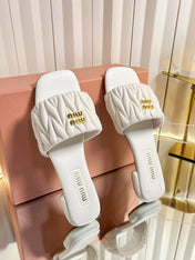 MIUMIU 26S MATELASSE SLIDES IN IVORY WHITE CALFSKIN GOLD HARDWARE