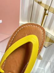 MIUMIU 26S THONG FLAT SANDALS IN YELLOW CALFSKIN