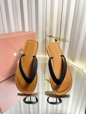 MIUMIU 26S THONG FLAT SANDALS IN BLACK CALFSKIN