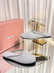 MIUMIU 26S FLAT MULES IN GREY FABRIC AND LEATHER