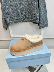 TRIANGLE LOGO MULES IN BEIGE SUEDE AND SHEARLING LINING