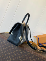 MADELEINE 30 IN BLACK MIX WHITE MONOGRAM CALFSKIN EMBOSSED LOGO