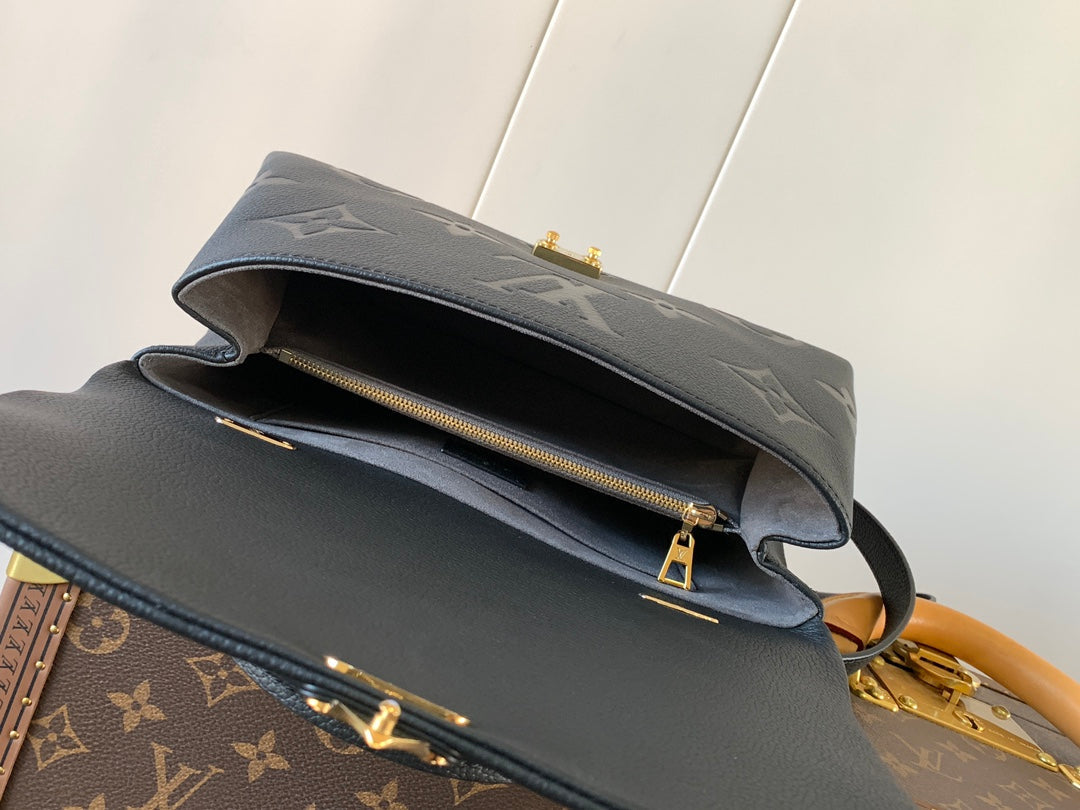 MADELEINE 30 IN BLACK MIX WHITE MONOGRAM CALFSKIN EMBOSSED LOGO