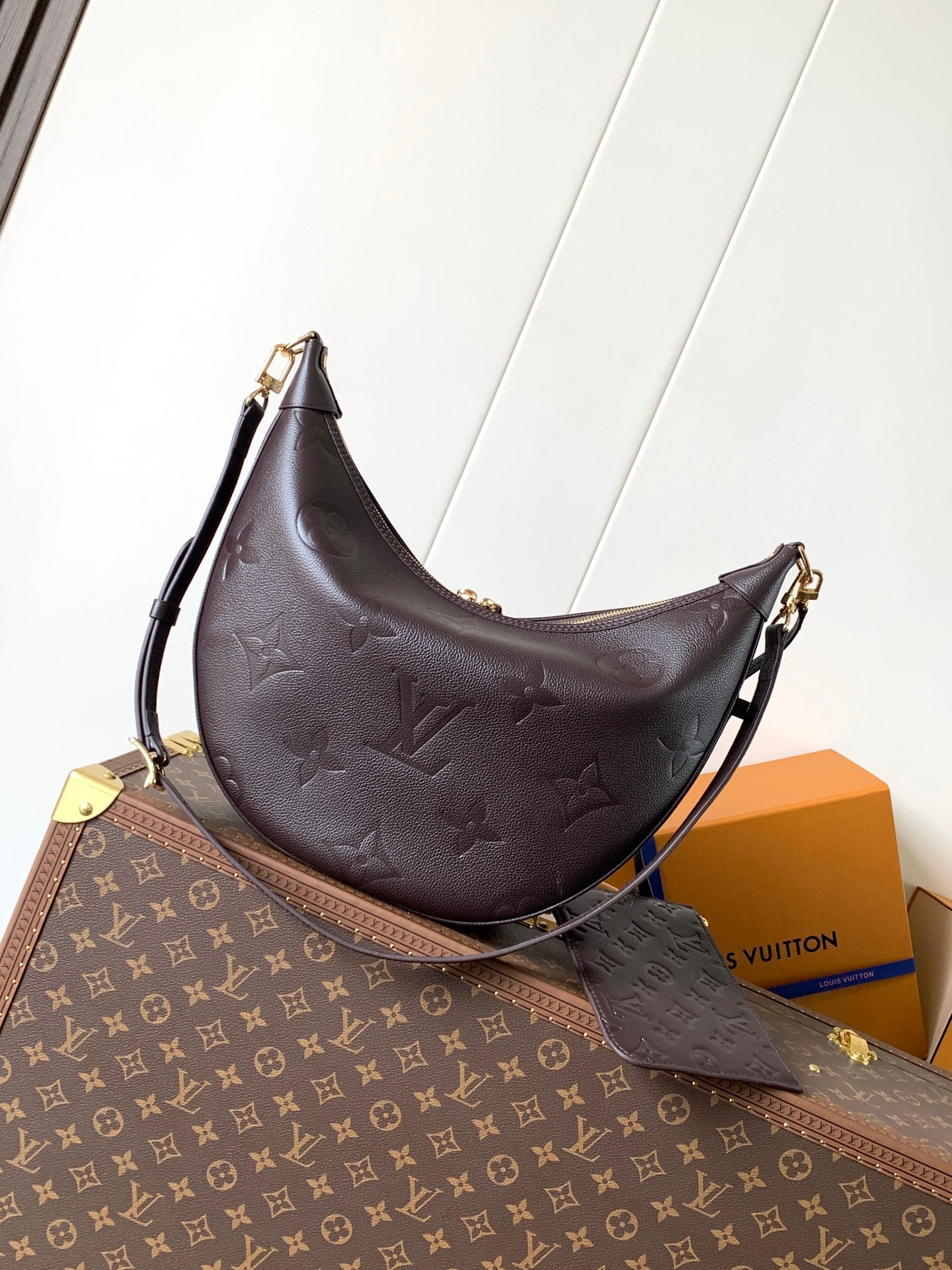 LOOP HOBO 38 IN DARK BROWN MONOGRAM CALFSKIN EMBOSSED LOGO
