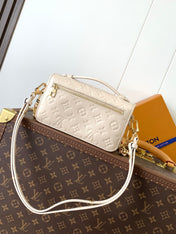 POCHETTE MÉTIS EAST WEST 22 IN LIGHT BEIGE MONOGRAM EMPREINTE CALFSKIN EMBOSSED