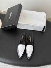 CHANEL 26S SLINGBACK FLAT IN BLACK AND WHITE CALFSKIN WITH CC LOGO