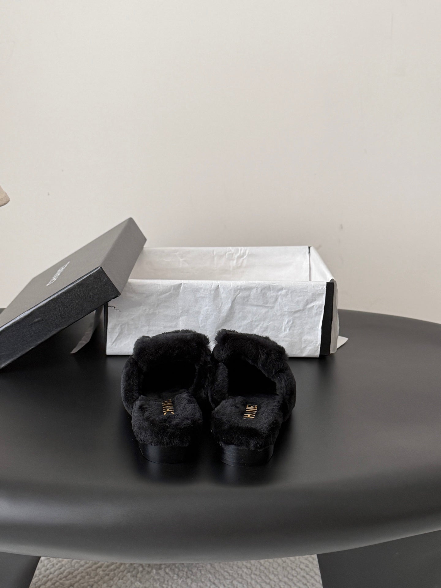 CHANEL 26S MULES IN BLACK SHEARLING LINING