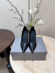 CURVED HEEL SHALLOW MOUTH PUMPS IN BLACK CALFSKIN