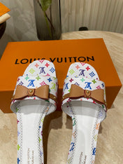 FLAT MULES IN WHITE MONOGRAM LAMBSKIN