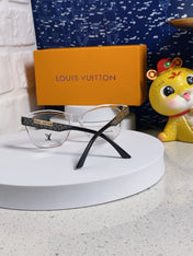 CAT EYE SUNGLASSES 570278 IN CLEAR ACETATE EMBOSSED LOGO