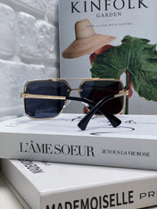 SQUARE SUNGLASSES 570265 IN GOLD METAL LOGO ON LENS