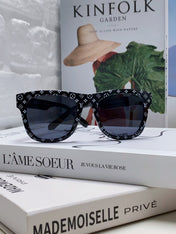 MONOGRAM SUNGLASS 581386 IN BLACK ACETATE FRAME