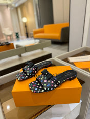 LV X TM 6AM FLAT MULE IN BLACK MONOGRAM CALFSKIN