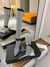 BALMAIN 26S HIGH-TOP BOOTS 75 MM IN BLACK AND WHITE FLYKNIT