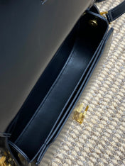 VOLTAIRE HALF-MOON SHOULDER BAG 24 IN BLACK CALFSKIN GOLD METALLIC