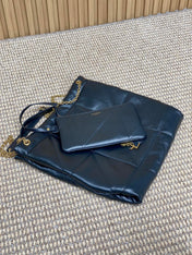 DRAWSTRING CHAIN STRAP SHOULDER BAG 39 IN NAVY BLUE QUILTED CALFSKIN