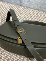 VOLTAIRE HALF-MOON SHOULDER BAG 24 IN DARK GREEN CALFSKIN GOLD METALLIC