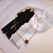 CD 26S PEARL STAR LOGO PENDANT NECKLACE IN GOLD TONE METAL