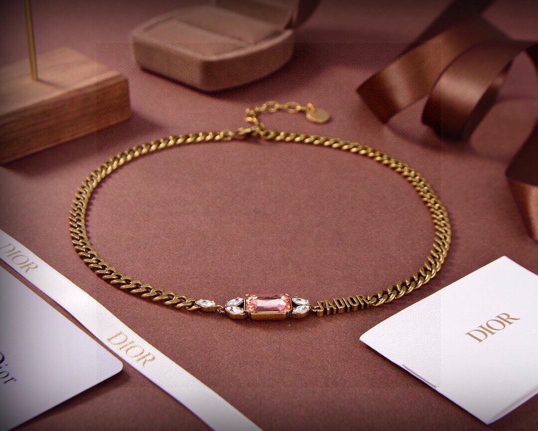 CD 26S DIOR LOGO PINK CRYSTAL CHAIN NECKLACE IN AGED GOLD METAL 633118