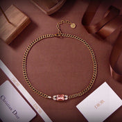 CD 26S DIOR LOGO PINK CRYSTAL CHAIN NECKLACE IN AGED GOLD METAL 633118