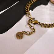 CD 26S DIOR LOGO PINK CRYSTAL CHAIN BRACELET IN AGED GOLD METAL 633120