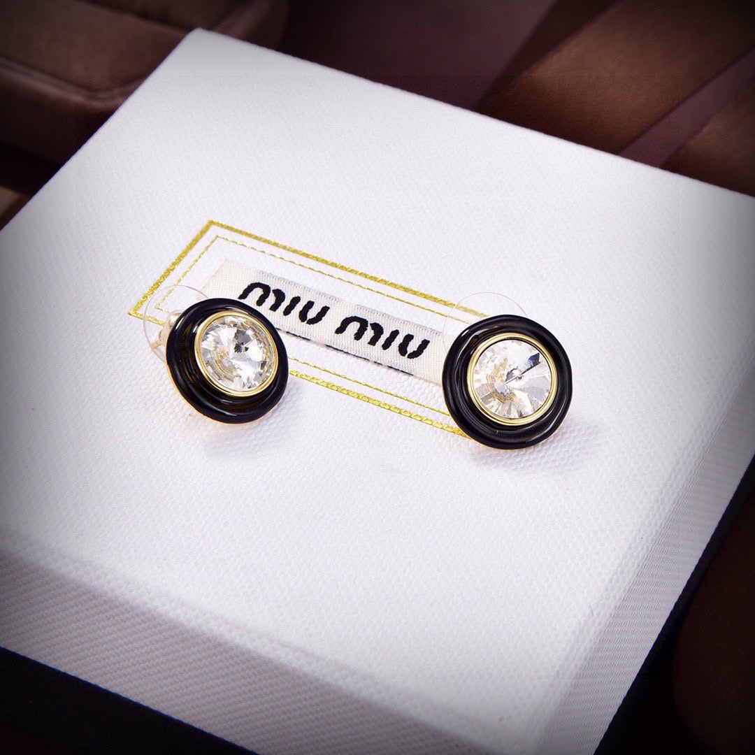 MIUMIU 26S ROUND CRYSTAL STUD EARRINGS IN BLACK RESIN AND GOLD TONE METAL 633262